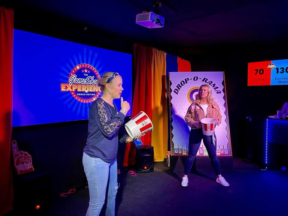 people participating in games during the Game Show Experience